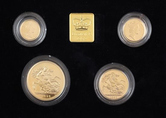 A cased Royal Mint 1992 gold proof sovereign four coin collection set,